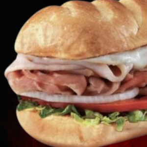 Hook & Ladder Prime Rib Steak Sub with prime rib, turkey, and ham and melted Monterey Jack